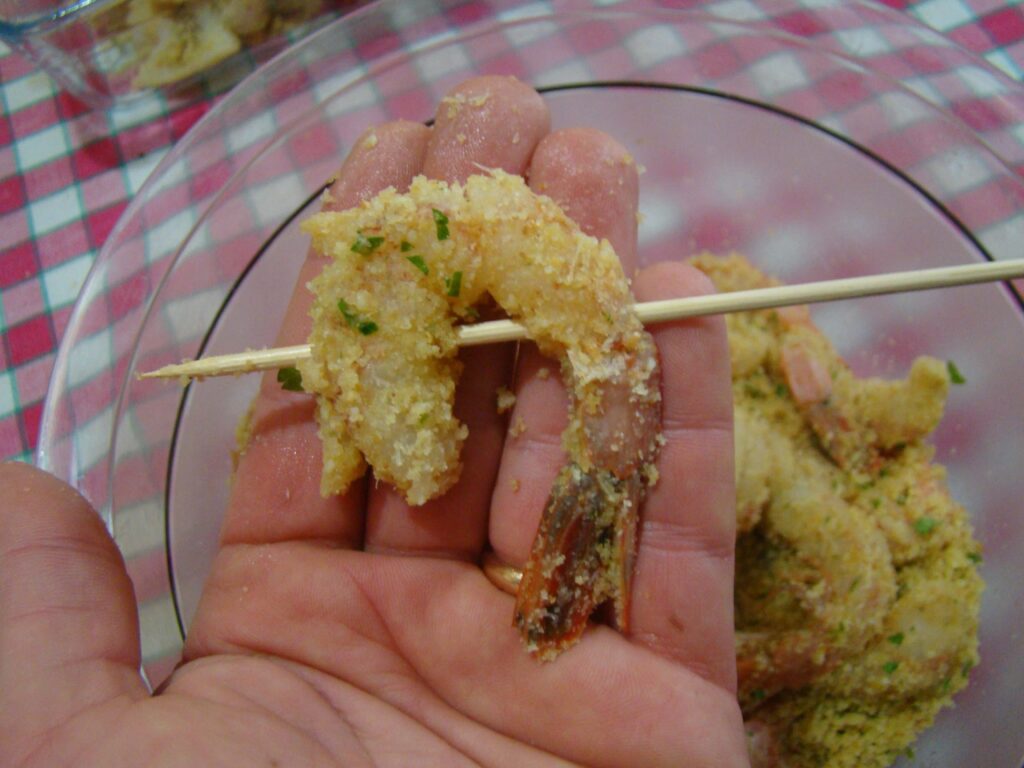 Composizione spiedino di gamberi alla romagnola